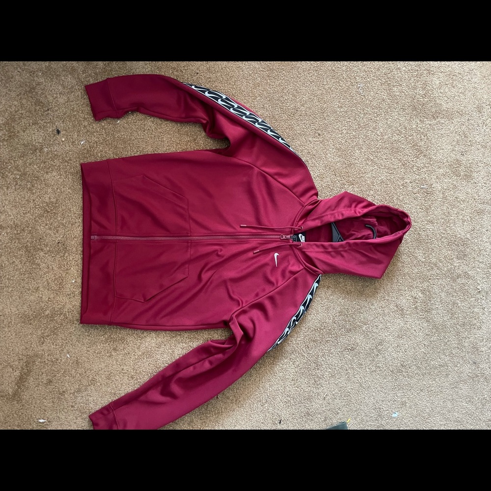 burgundy nike jacket size XS but fits like a Small
